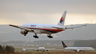 Report: Suitcases Found Near Wing Part Suspected From MH370